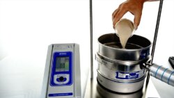 Ultrasonic sieve shaker for efficient and reliable powder screening applications in laboratories.