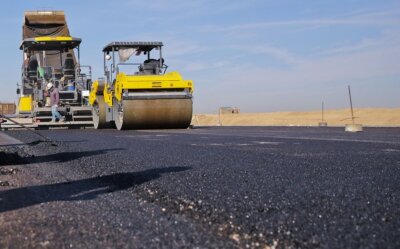 Ultrasonic mixing of asphalt additives